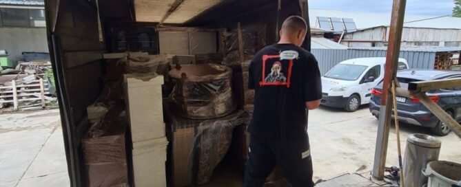 NV mover loading packed furniture into the van during a move in Plovdiv