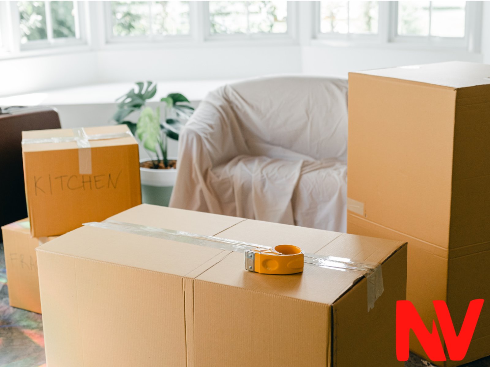 Boxes and furniture wrapped in covers before a move in Plovdiv
