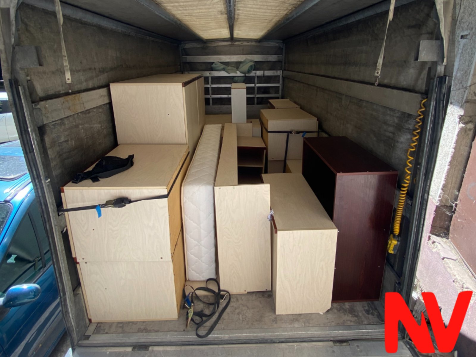 Packed furniture arranged inside the NV moving van in Plovdiv